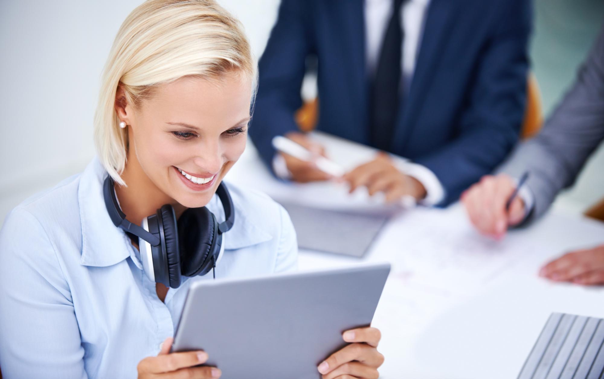 consultant reviewing regulatory finance documents in modern office